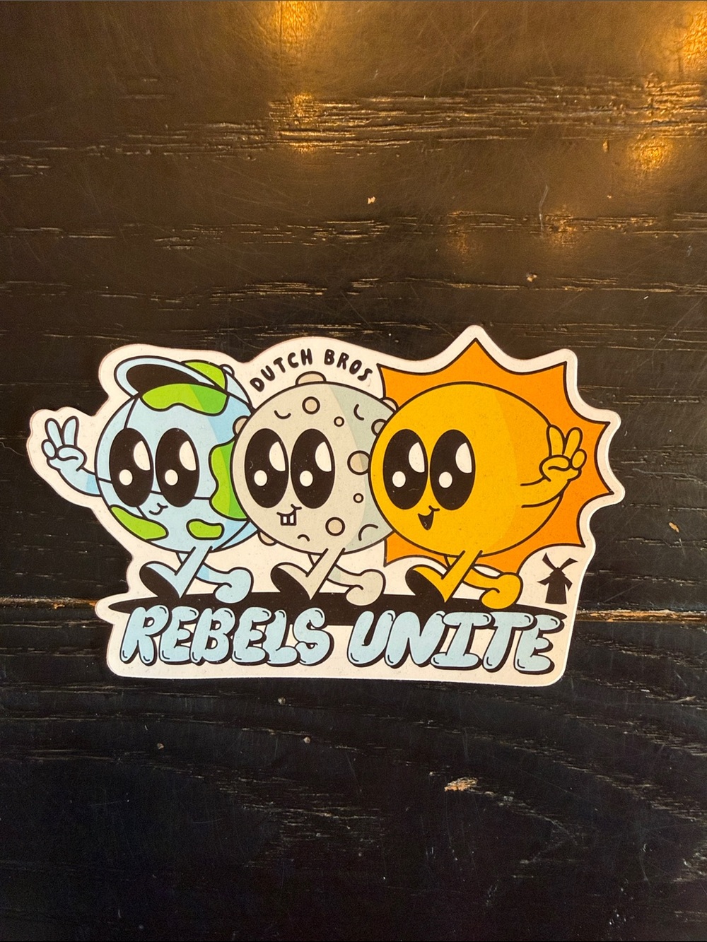 Dutch Bros Rebels Unite Sticker - Yellow, Blue, Gray